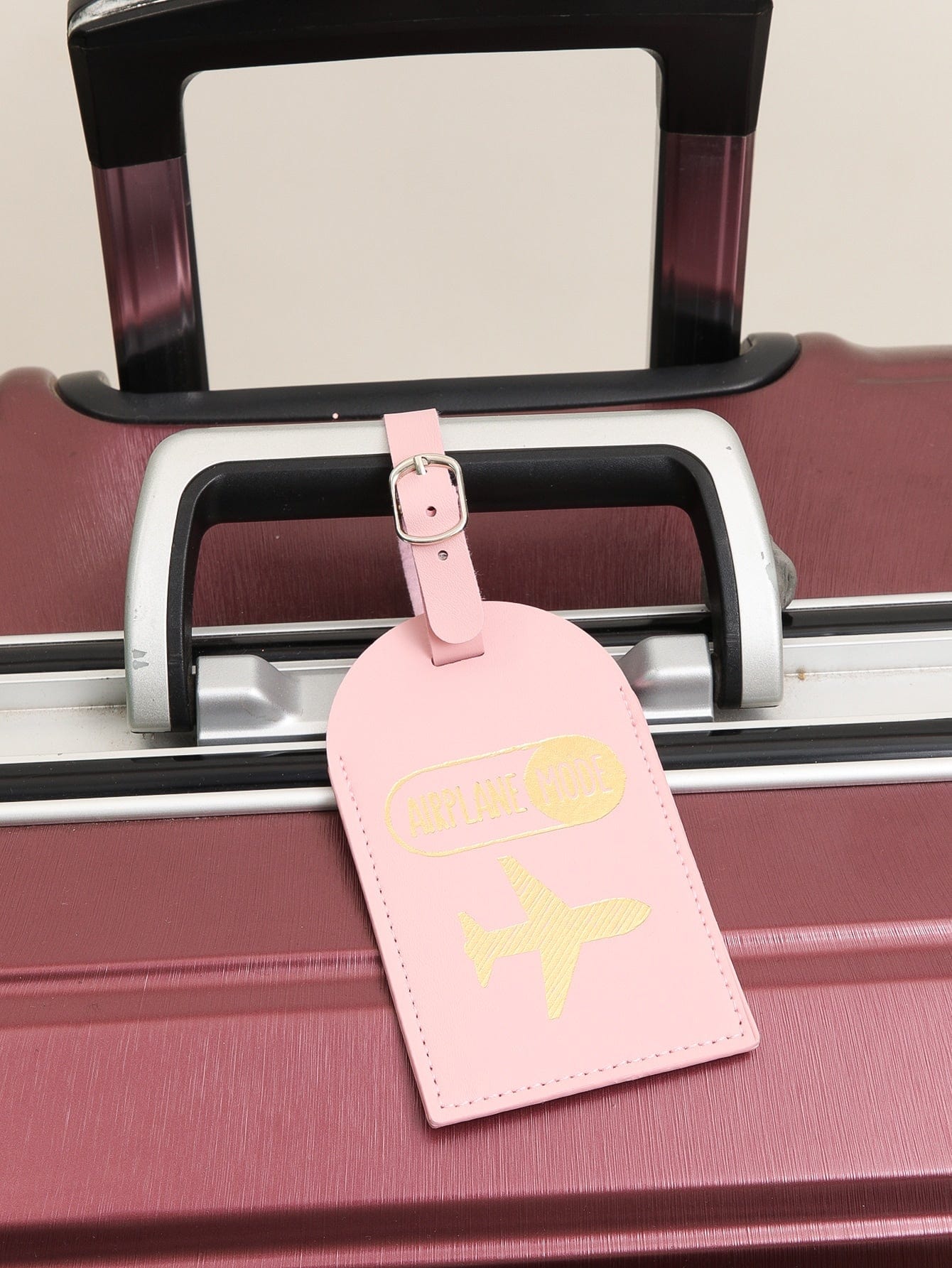 Pink airplane mode luggage tag
