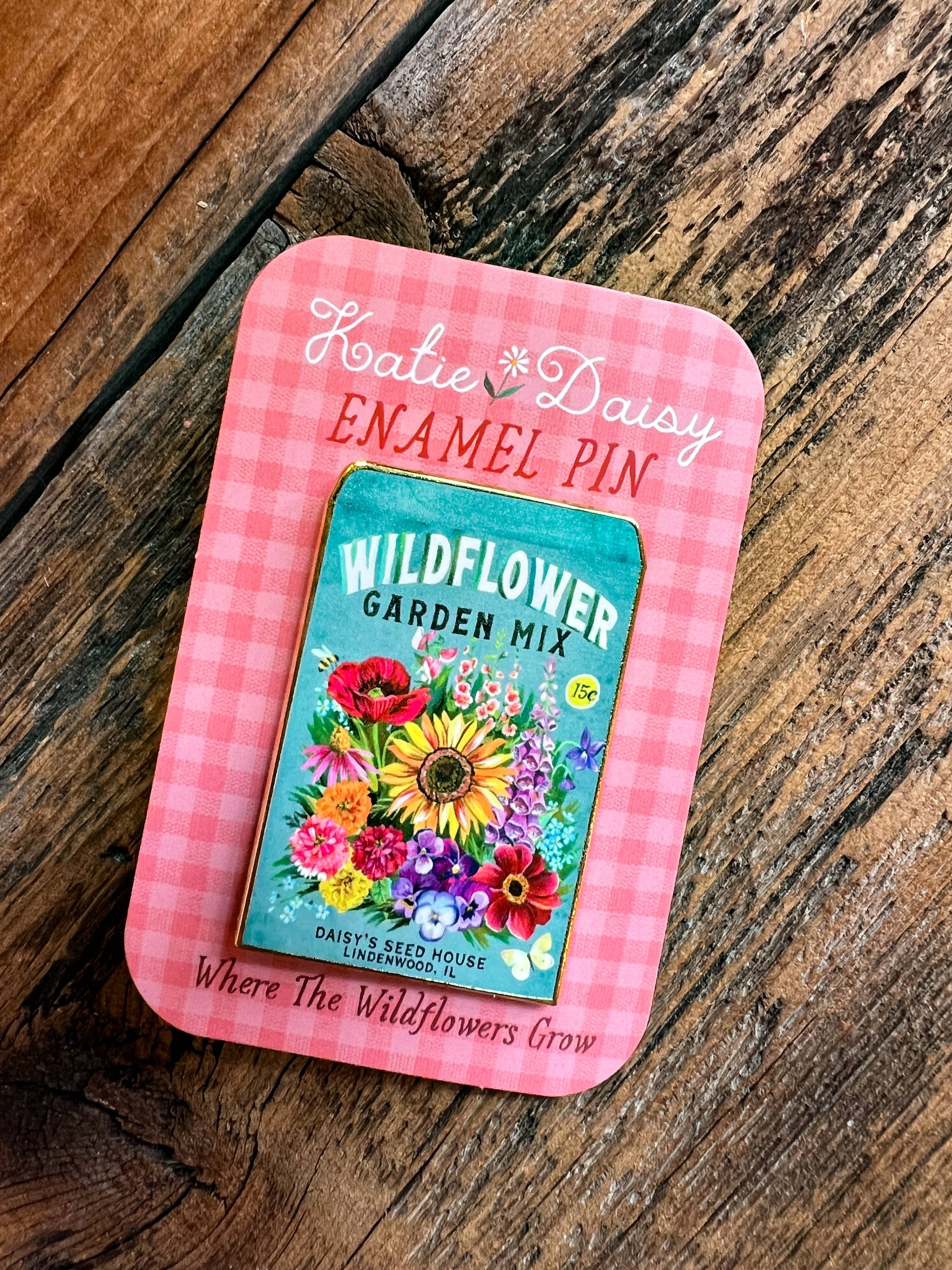 Seed Packet Enamel Pin by Katie Daisy